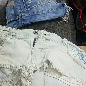 Two Hollister Jean denim shorts 11 30 fringed sexy